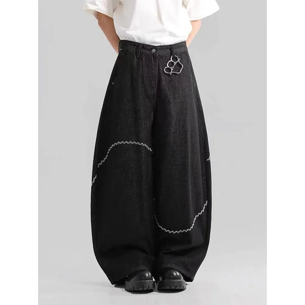 Black straight leg trousers with micro-elastic denim fabric and zip fly opening