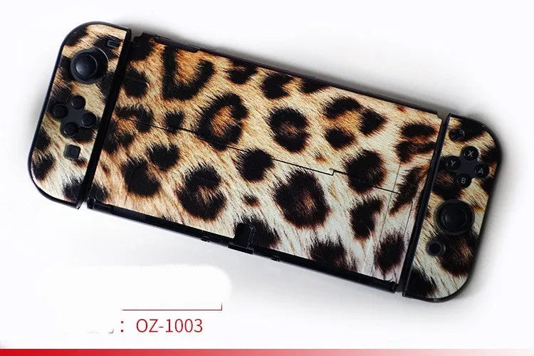 Nintendo Switch OLED hard protective case with cartoon pattern design showing front and back views
