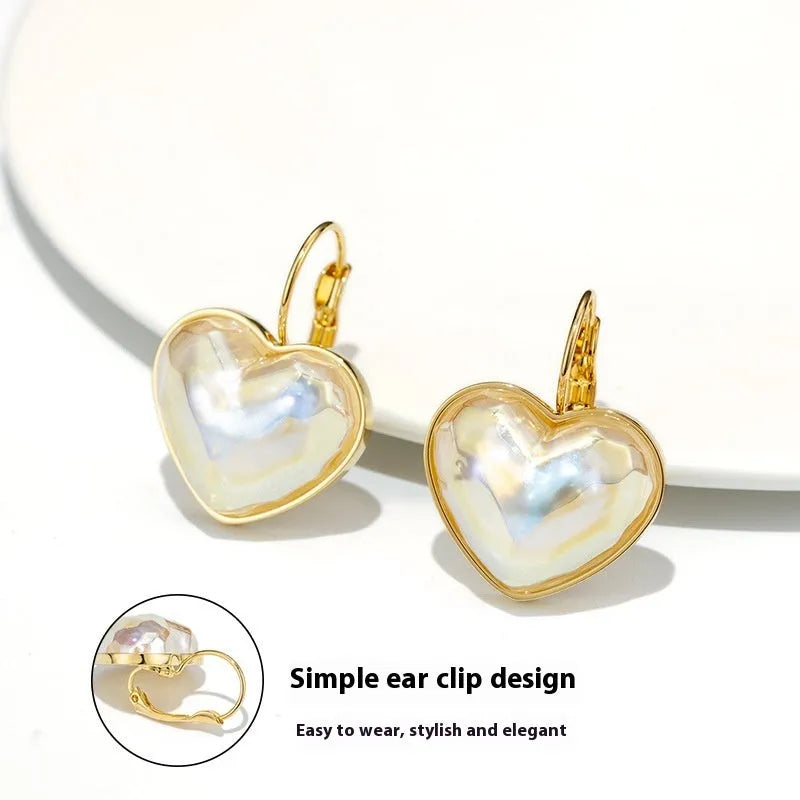 Gold summer love ear clips with alloy metal construction and clip-on design