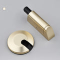 Zinc alloy invisible door stopper in brushed nickel finish on a wooden floor