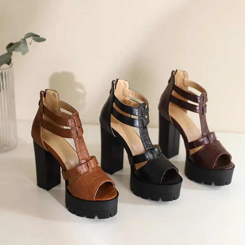 Women's black platform high heel sandals with a round toe and back zipper.