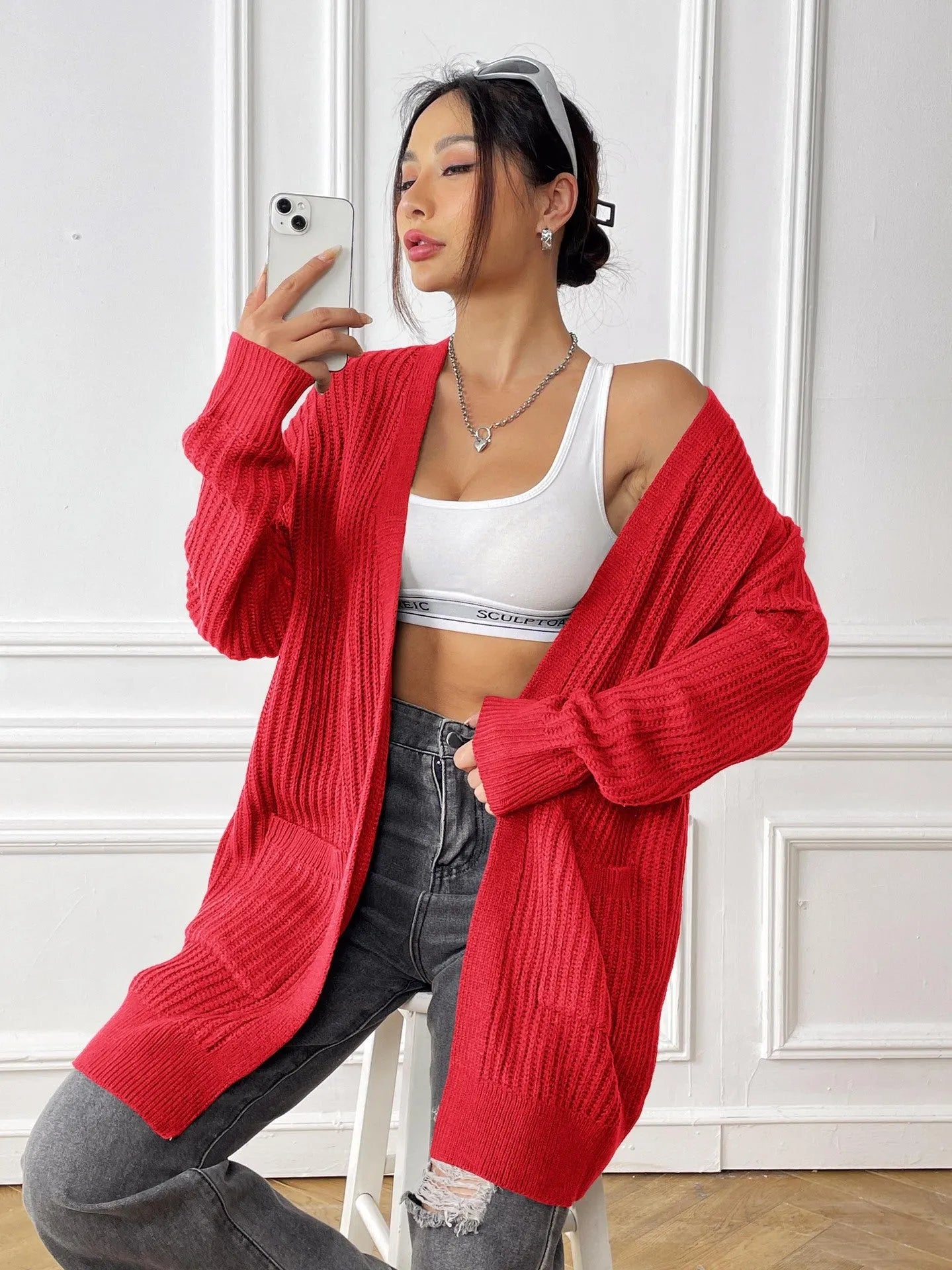 Women's mid-length loose fit cardigan with double pockets in dark green colour