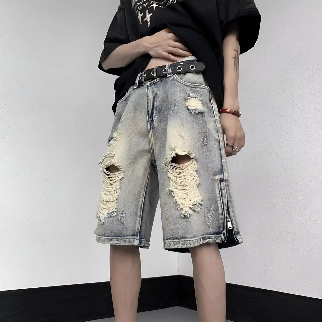 Blue retro denim shorts with tattered detailing and wide leg cut for summer wear