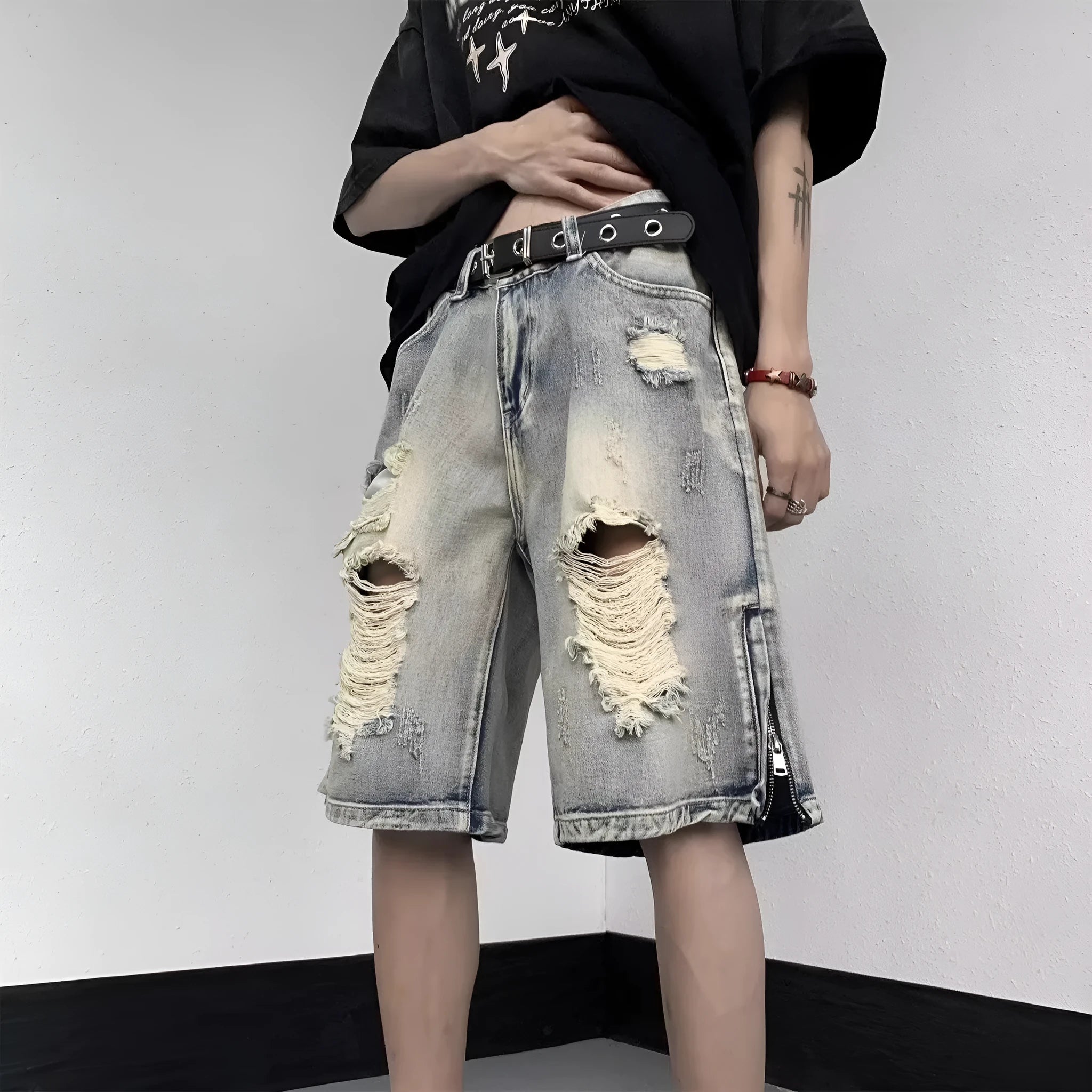 Blue retro denim shorts with tattered detailing and wide leg cut for summer wear