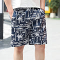 Men's casual floral print five-point swimming trunks made from polyester fabric.