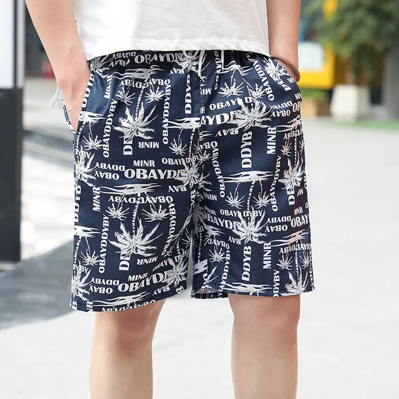Men's casual floral print five-point swimming trunks made from polyester fabric.