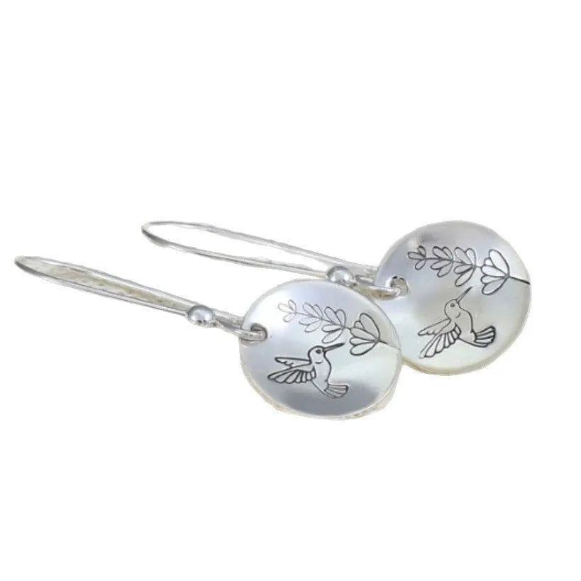 Glossy silver women's earrings with a detailed bird and floral leaf design in a retro style.