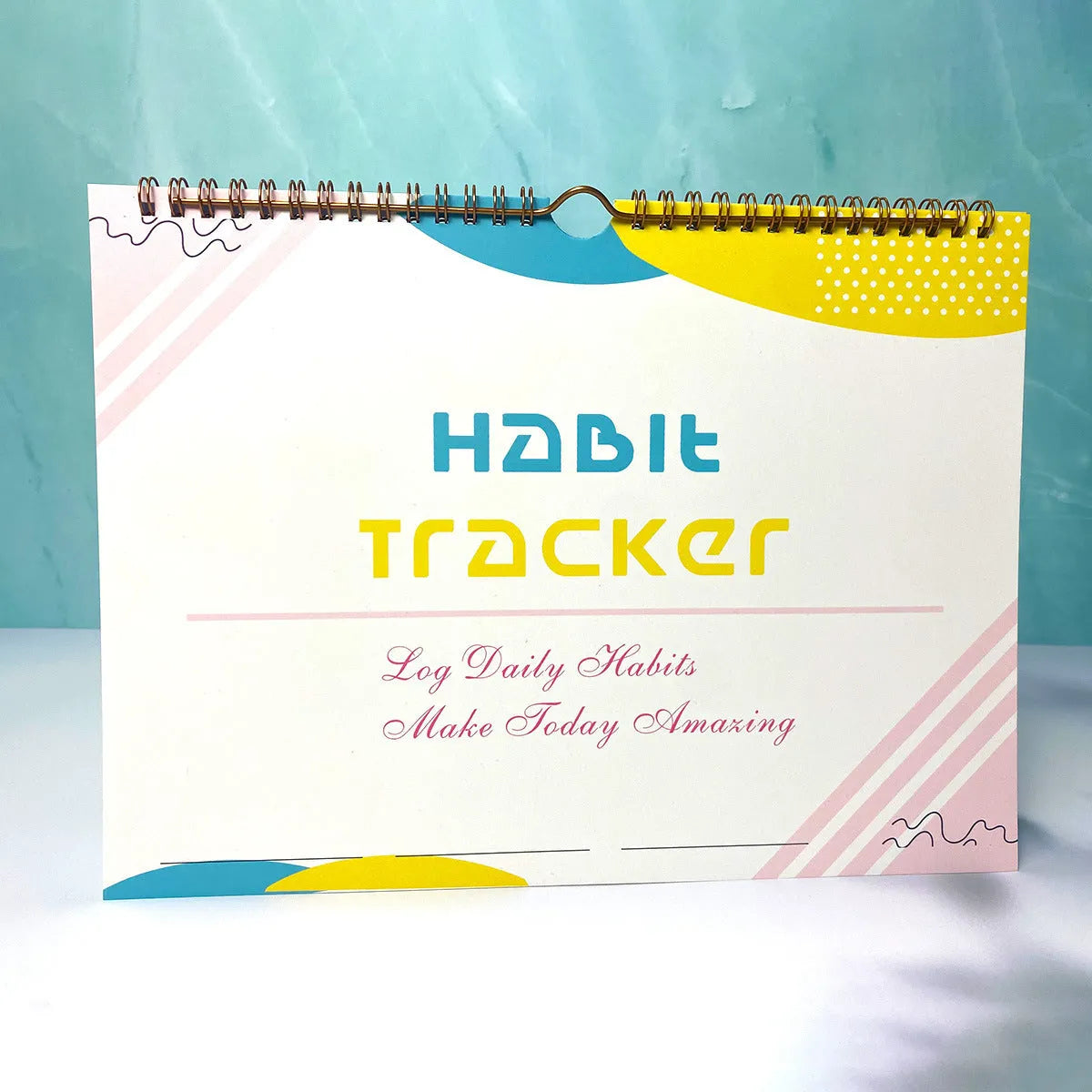 English habit tracking notebook with 12 pages in A4 21cm by 28cm format showing colour options