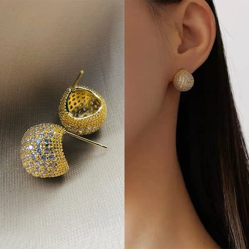 Geometric drop-shaped ear clip earrings with full diamond little golden beans detailing in gold and white finishes