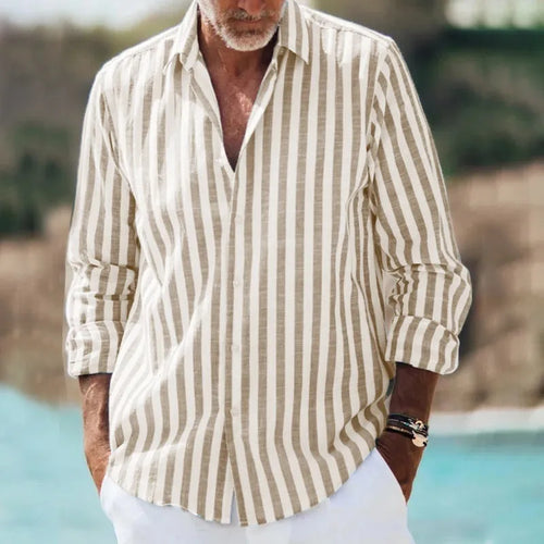 Man wearing a loose-fit 3D printed floral lapel shirt in a colourful pattern, short sleeves.