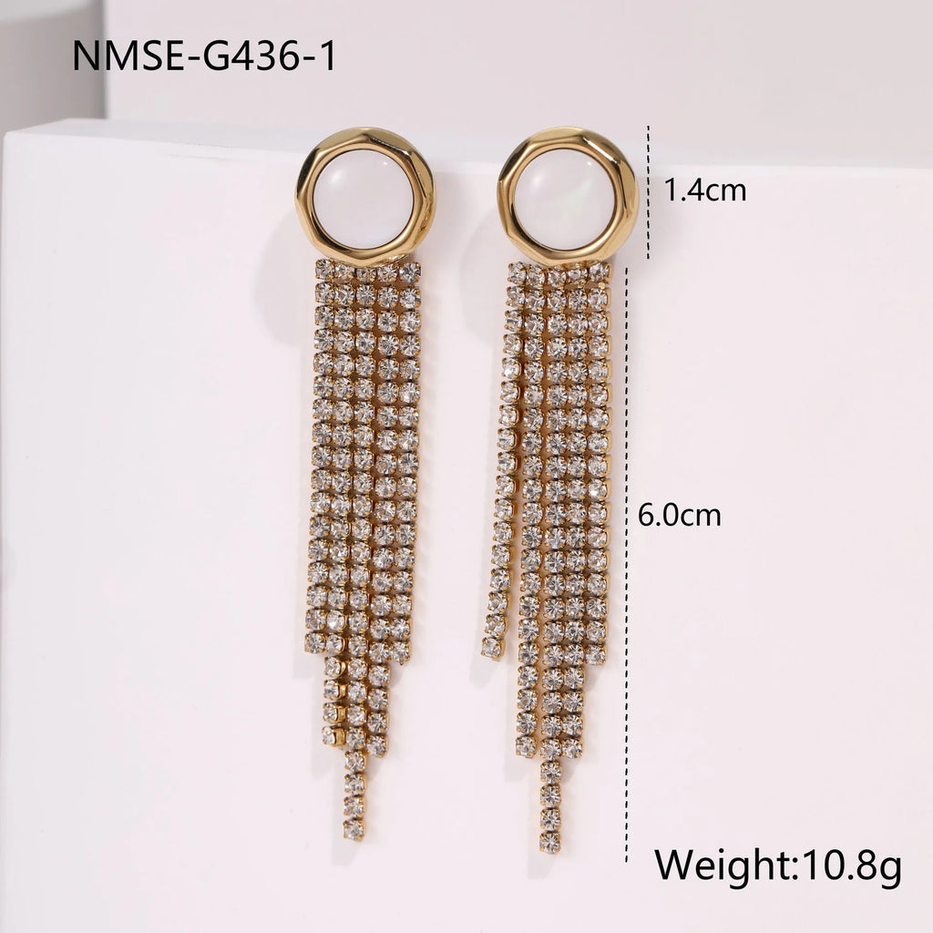 Stainless steel tassel earrings with 18K gold electroplated finish and diamond tips in heart and star shapes