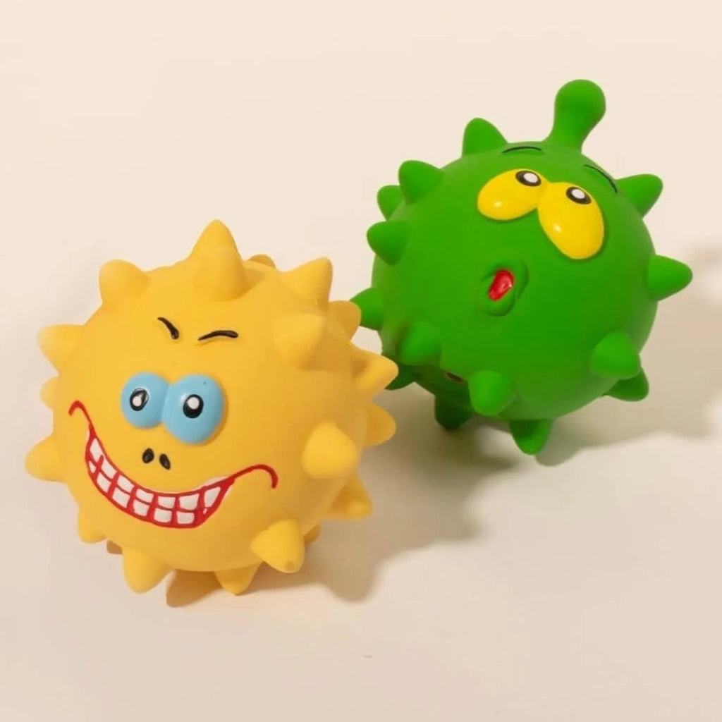 Four colourful natural latex squeaky dog balls with bumpy texture and cute faces