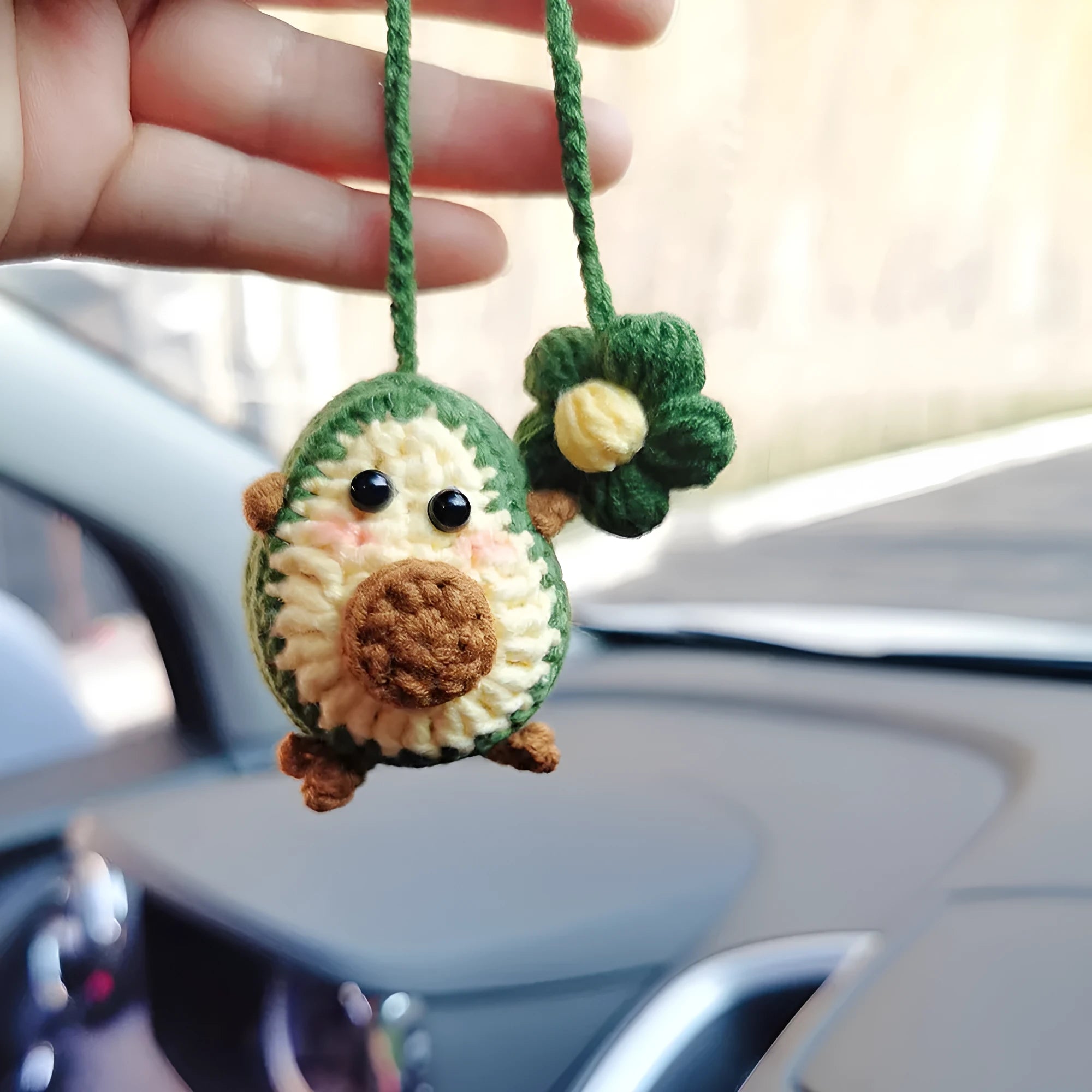 Handmade crocheted avocado rainbow flower car pendant in wool with cartoon styling