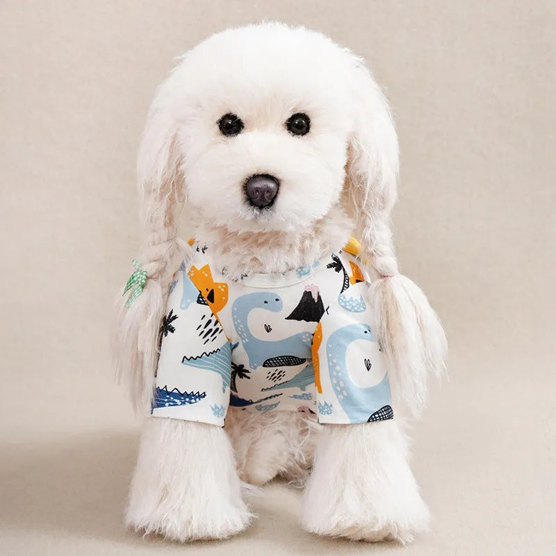Printed polyester t-shirt for a small dog on a white background, showing colour and design.
