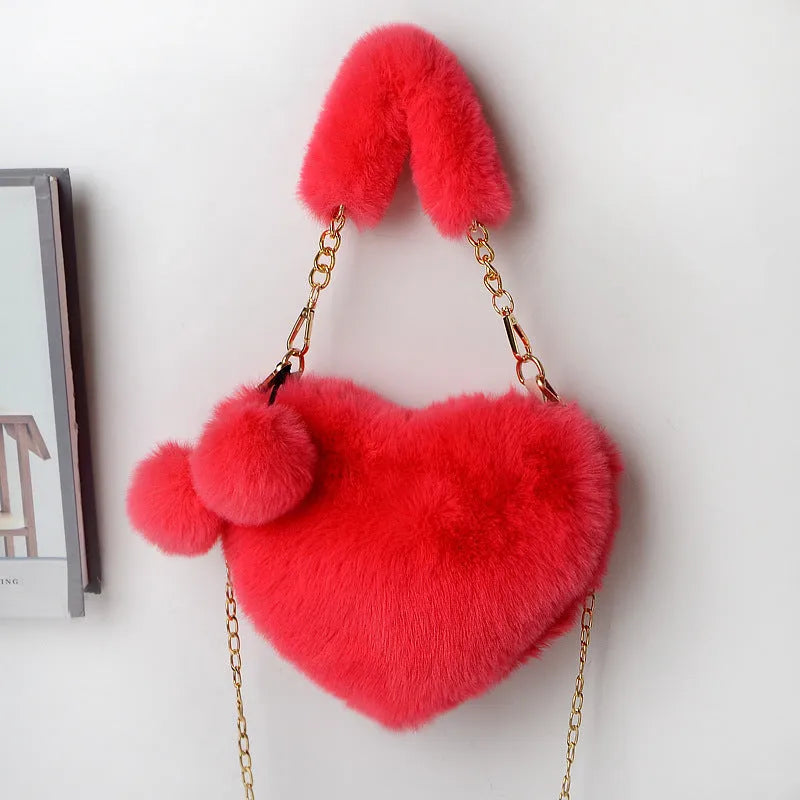 Soft plush heart-shaped women's handbag in medium size with zipper closure