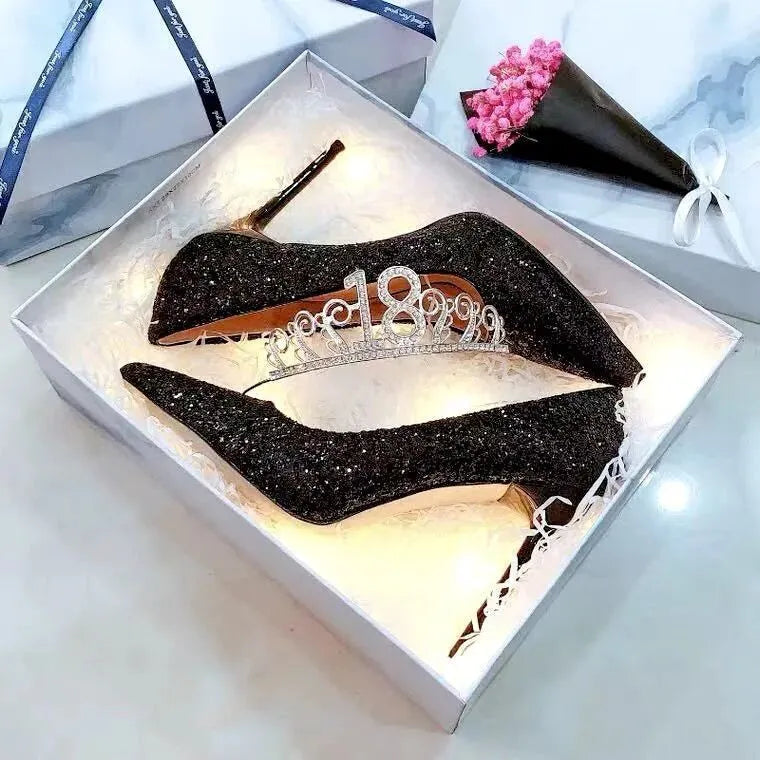 Women's silver crystal stiletto wedding shoe with a 9cm heel on a white background.