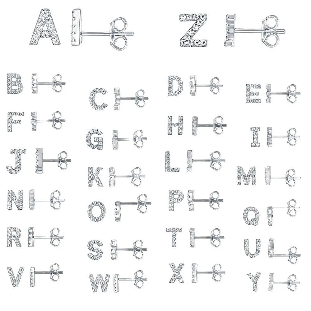 Brass gold plated alphabet earrings showing zircon letter detailing on copper base with gold plating