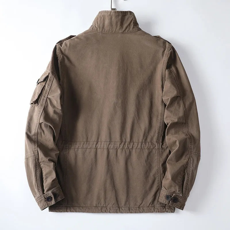 Men's loose fit cotton twill jacket in light brown, retro style, zip front, no hood.