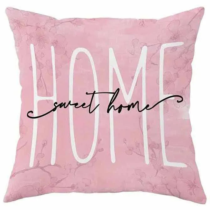 Short velvet cushion cover with cherry blossom letter print, 45cm square, shown in one of four colours.