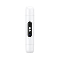 Pink and white electric body hair trimmer with USB charging cable on white background