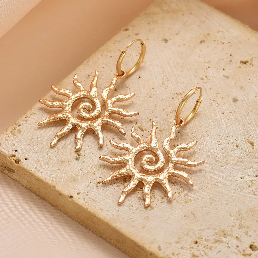 Gold sun hollow pendant necklace on regular chain with matching earrings and ring in zinc alloy electroplated finish