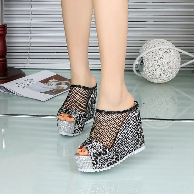 Korean chunky heel platform sandals with a hollowed-out heel and mesh upper in black.
