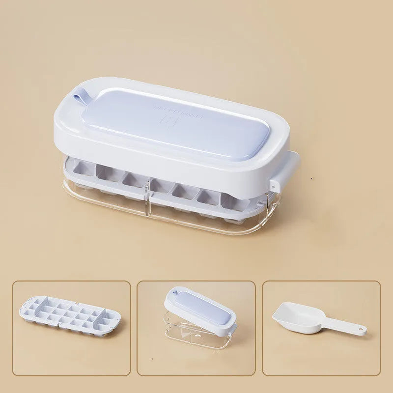 Yellow high-capacity ice cube tray with grid design and a storage slot for an ice shovel.