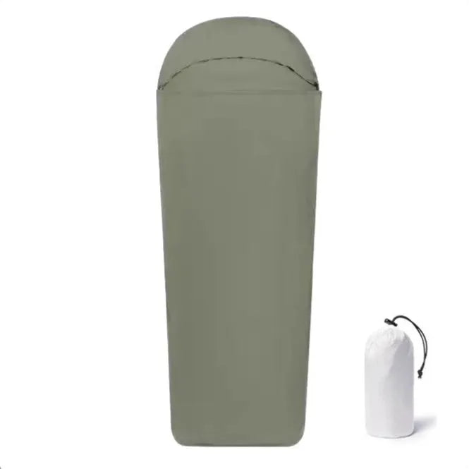 Blue mummy-type camping sleeping bag with nylon fabric shown packed and unpacked