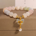 Crystal bracelet with natural Morganite butterfly pendant charm in candy colours on adjustable band