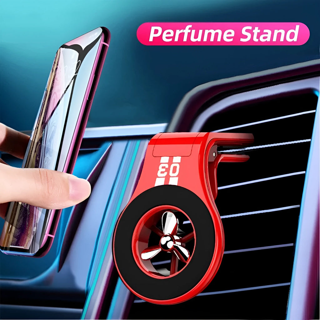 Black universal magnetic car phone holder clipped to a car air vent, holding a smartphone.