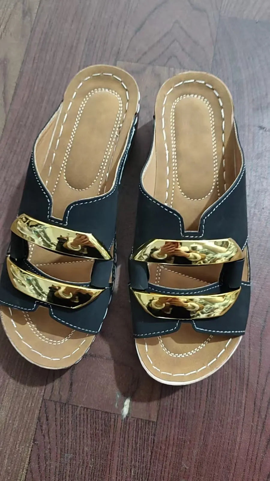Roman style platform sandals in white, black, khaki, and sea blue on a solid background