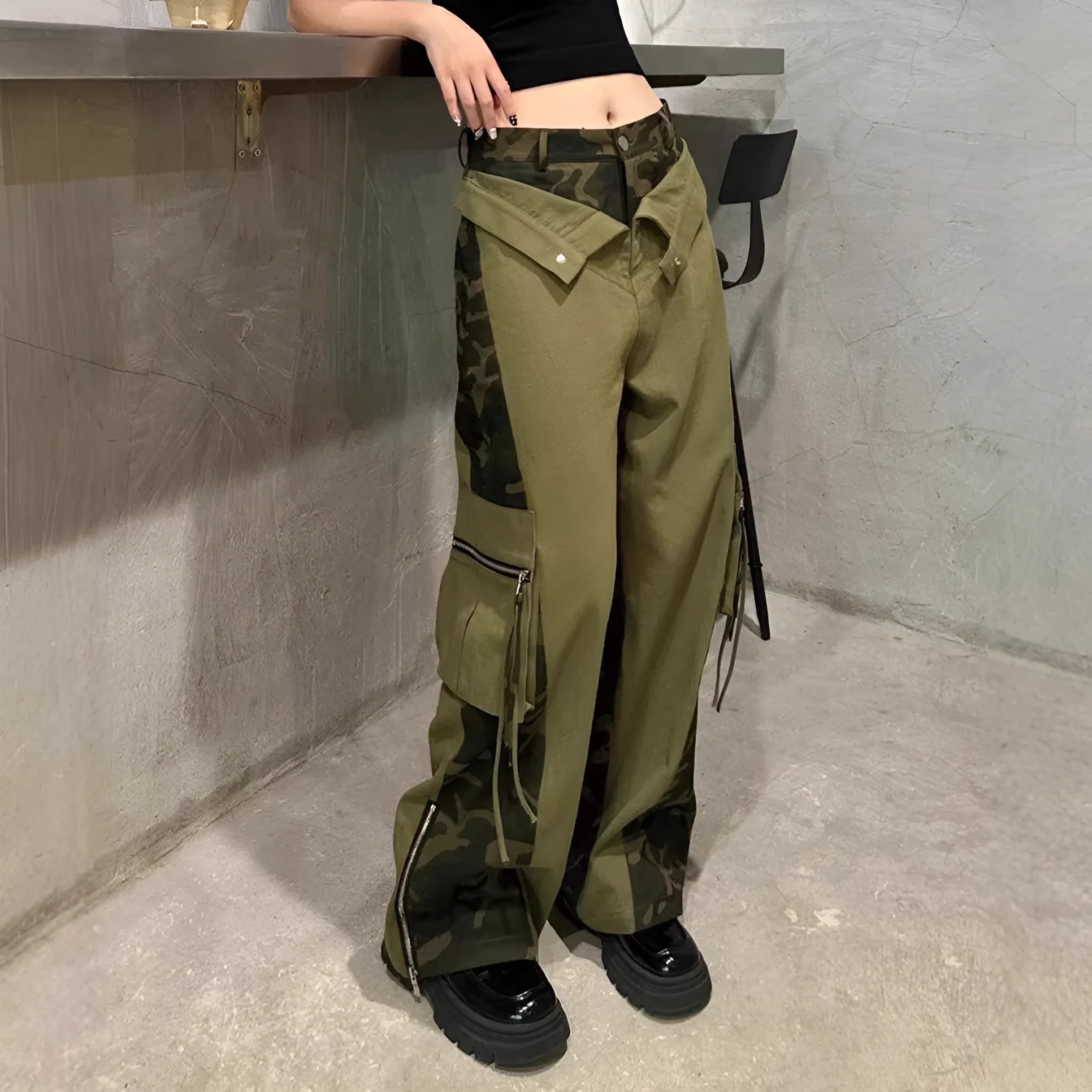 Women's high-waisted dark khaki jeans with leopard print and fake contrast stitching in a straight-leg style.