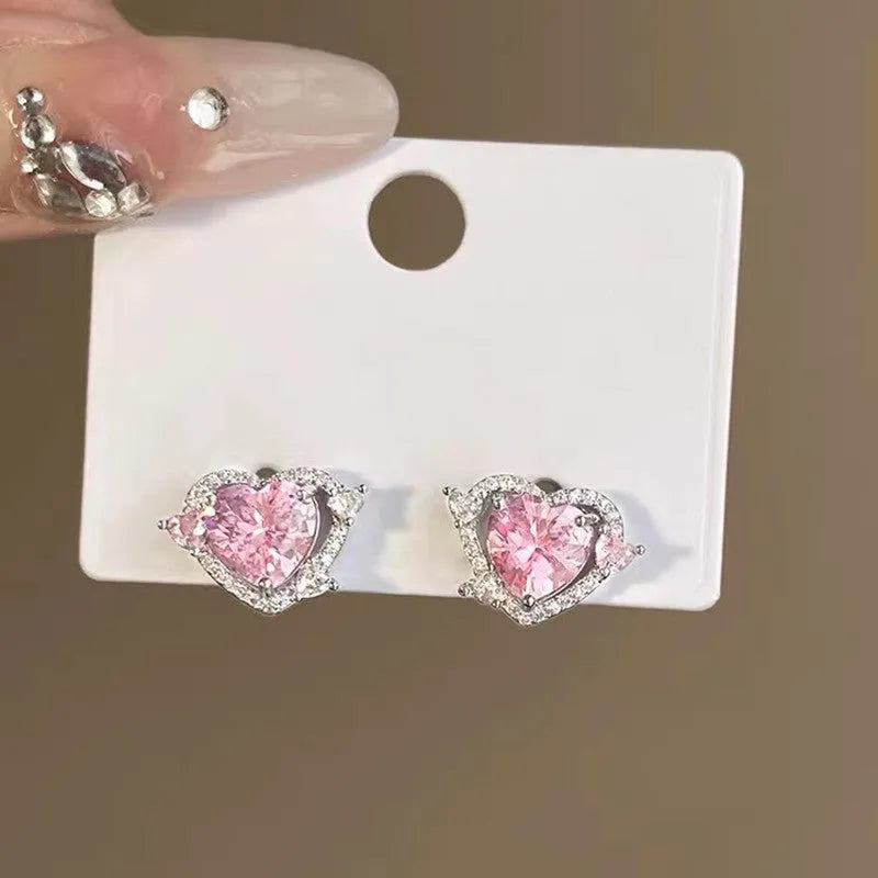 White heart-shaped stud earrings for women with copper construction and electroplated finish