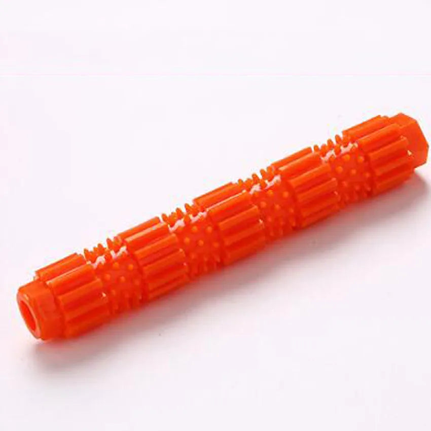 Green natural rubber dog chew toy with textured surface and treat-dispensing hole.