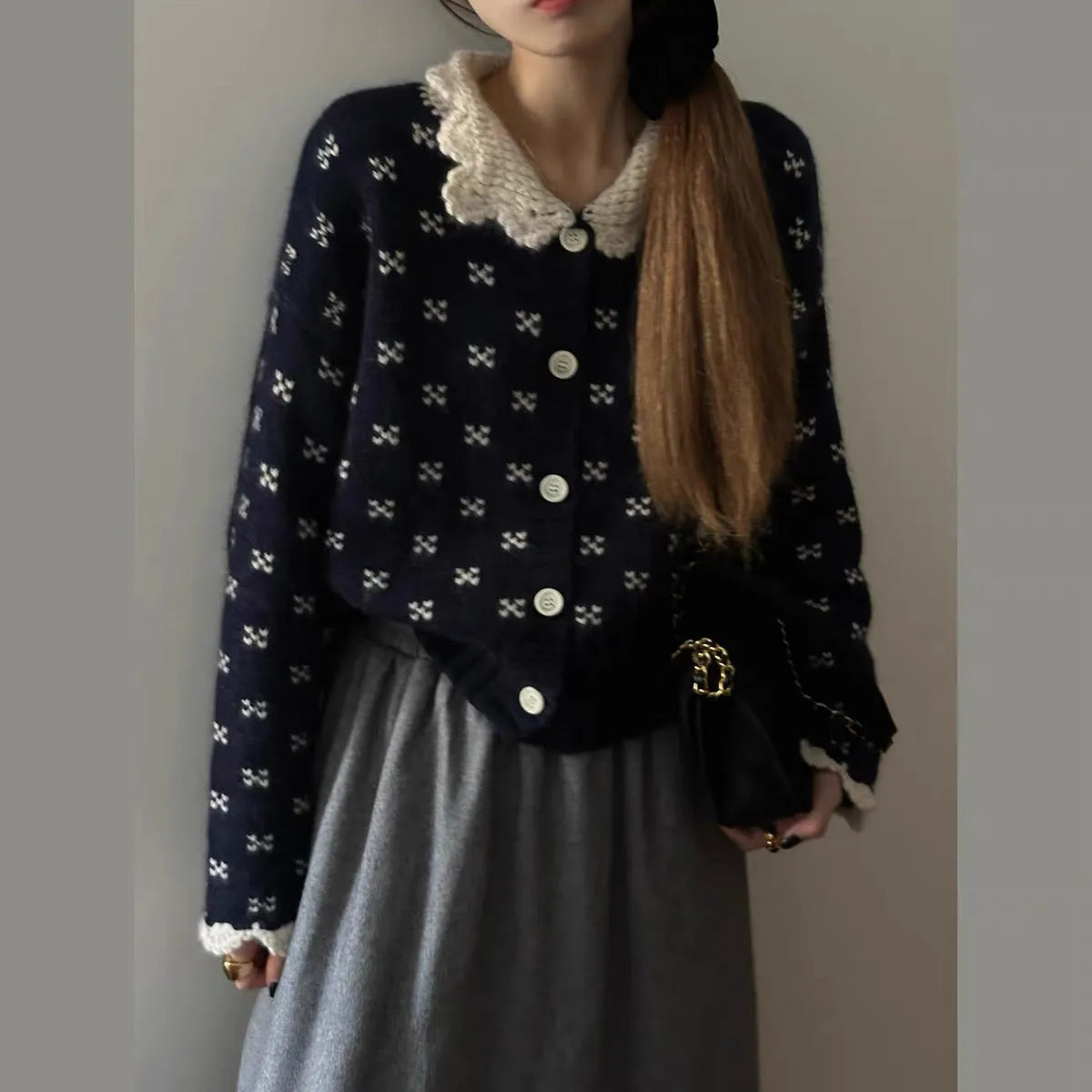 Floral pattern knitted cardigan coat with a Peter Pan collar in grey colour.