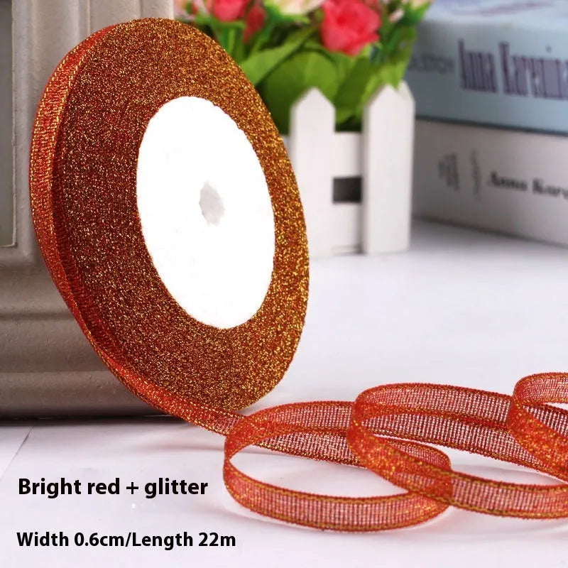 Roll of 0.6cm wide coloured polyester gift ribbon with 22 metre length.