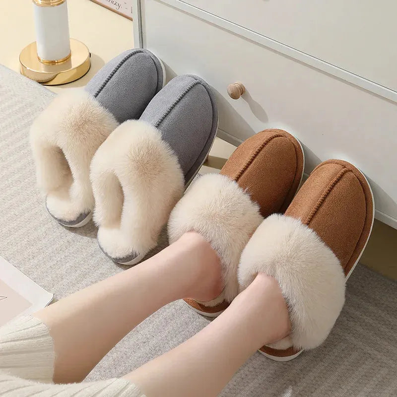 Women's brown plush indoor slippers with artificial wool lining and a textured PVC sole.