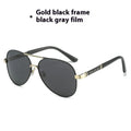 Men's polarised sunglasses with photosensitive colour changing lenses black frame and grey lenses