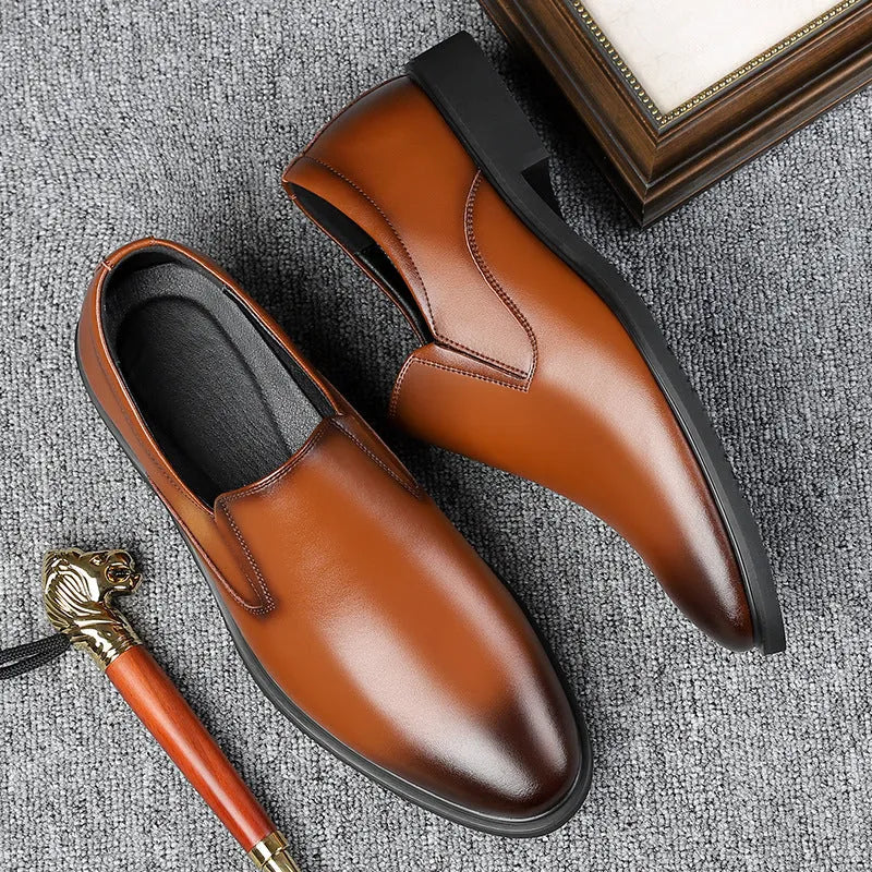 Men's black business casual slip-on shoes with leather toe cap and rubber sole