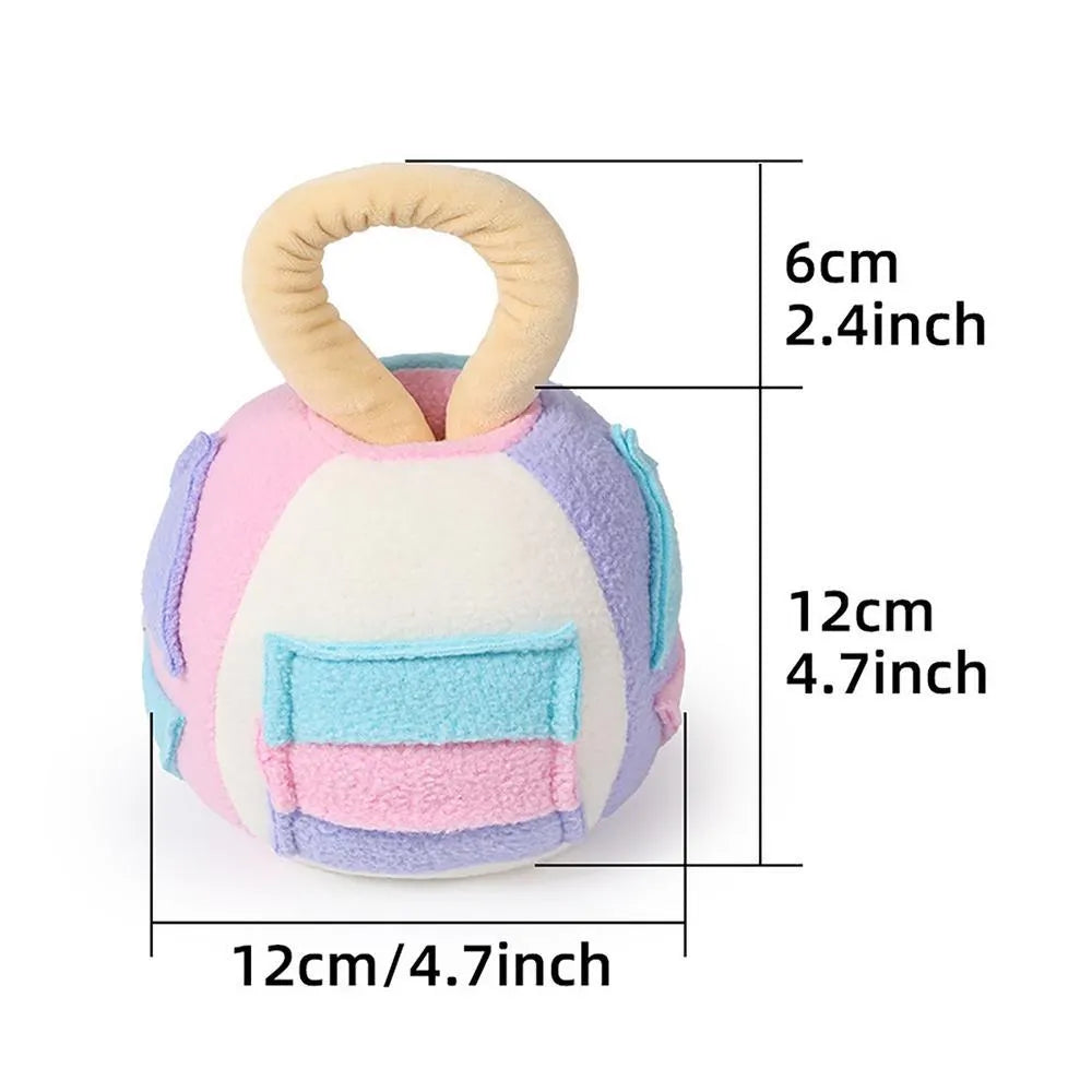Pink and green plush ball dog toy with squeaker and treat pockets on a white background.