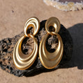 Copper double circle French retro earrings with U-shaped drop design in a plain gold quicksand finish.