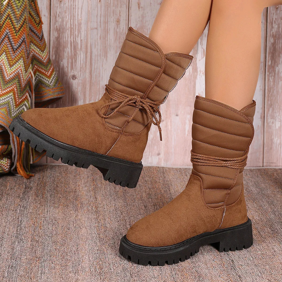 Women's black chunky heel snow boots with lace-up design and fleece lining