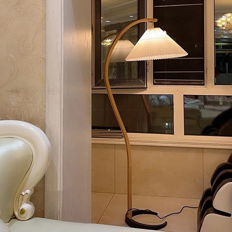 Retro vertical table lamp with fabric shade in white or red, showing three-colour light settings.