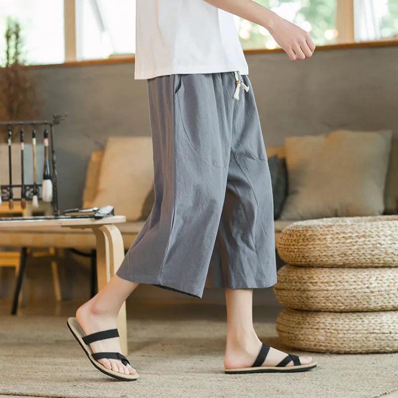 Pair of straight-leg skinny fit shorts in linen-cotton blend fabric, shown in khaki colour