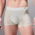 Men's seamless antibacterial fitness underwear shorts in a polyamide spandex blend on a grey background.