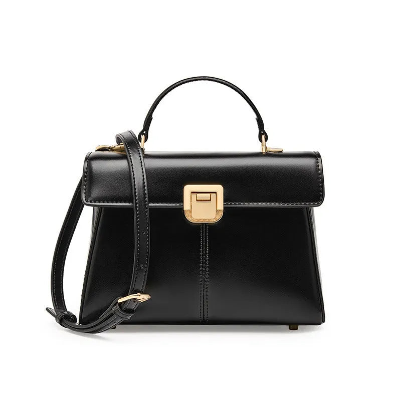Women's genuine leather shoulder bag with vachette clasp in horizontal square design showing internal compartments
