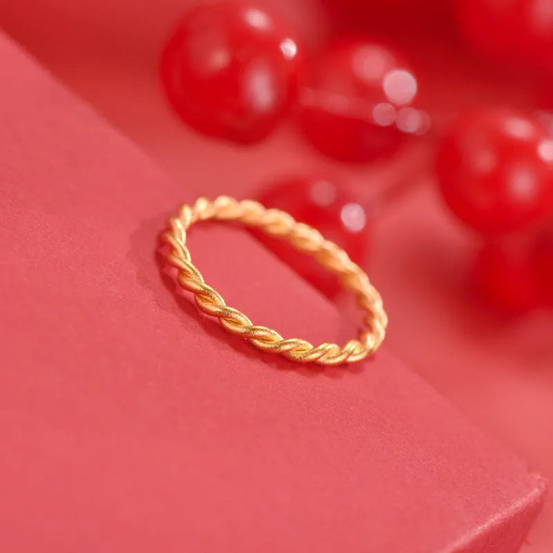 Women's brass gold plated ring showing twist, simple bracelet matte, and simple bracelet glossy styles