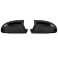 Pair of plastic Volkswagen Sagitar mirror housings in bright black and carbon fibre style finishes.