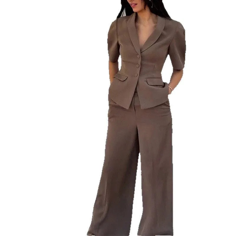 Brown men's polyester two-piece suit with slim fit waist, featuring a long-sleeved top and matching trousers.