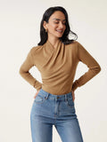 Camel coloured women's slim fit long sleeve pullover sweater on a hanger.